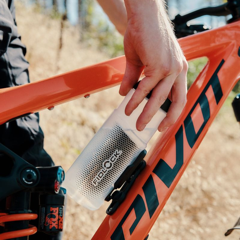 Porte-bidon + Bidon clear 600ml FIDLOCK incl.twist bike base